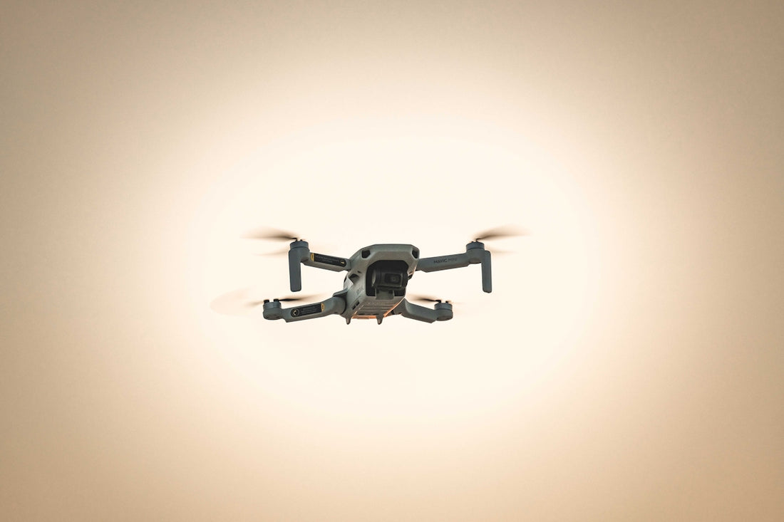 a small airplane flying in the sky