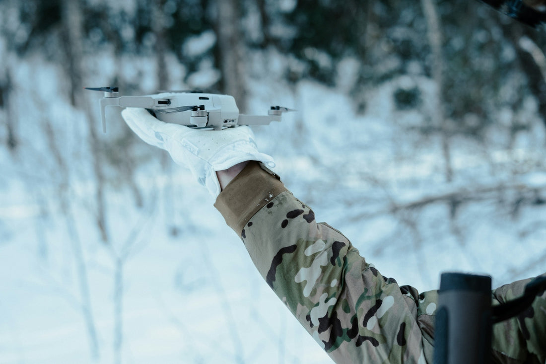 a person holding a drone